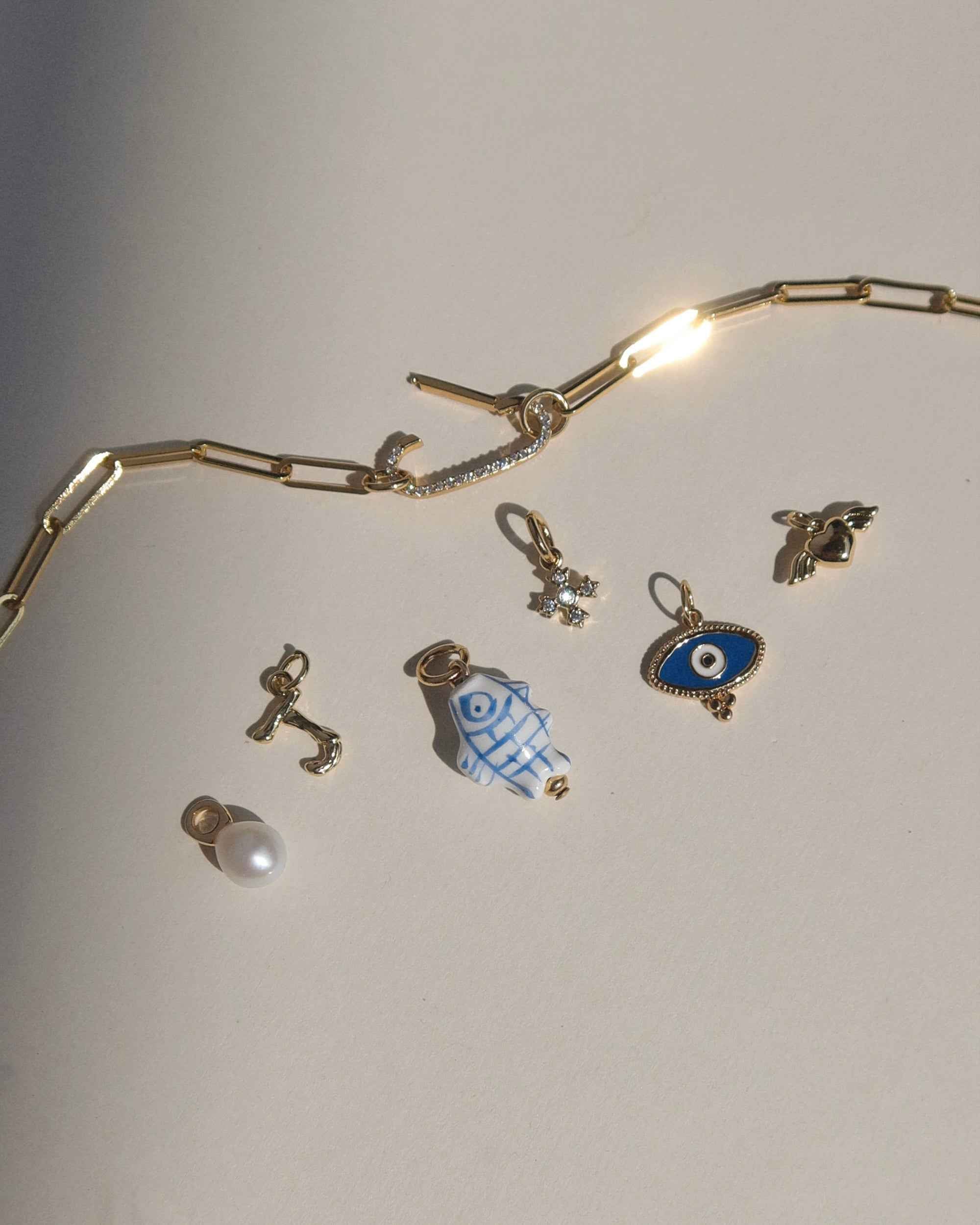 Moira Cross Charm