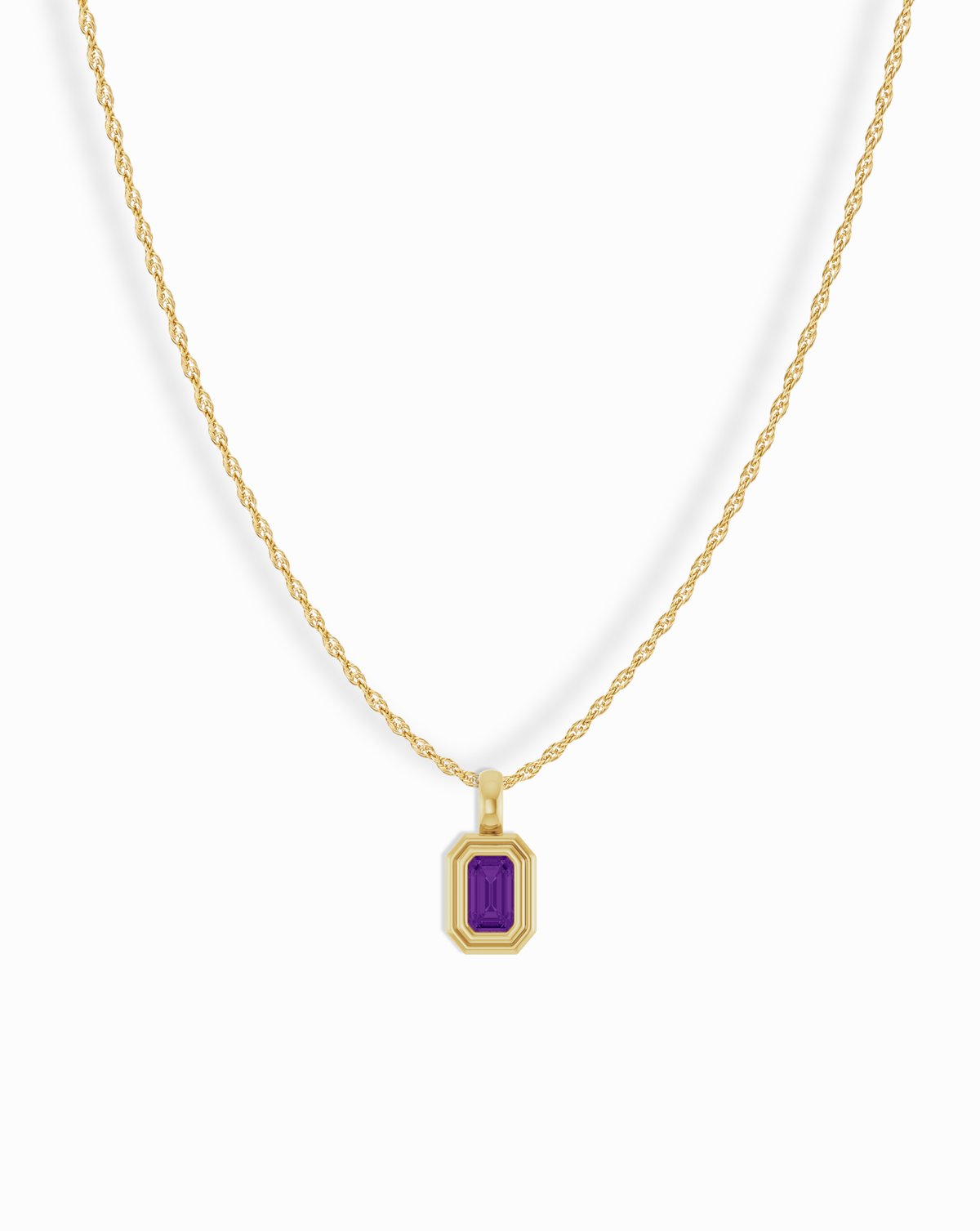 Mod + Jo 14k Birthstone Pendant Necklace consisting of a gold chain with a rectangular pendant featuring an emerald-cut purple gemstone.