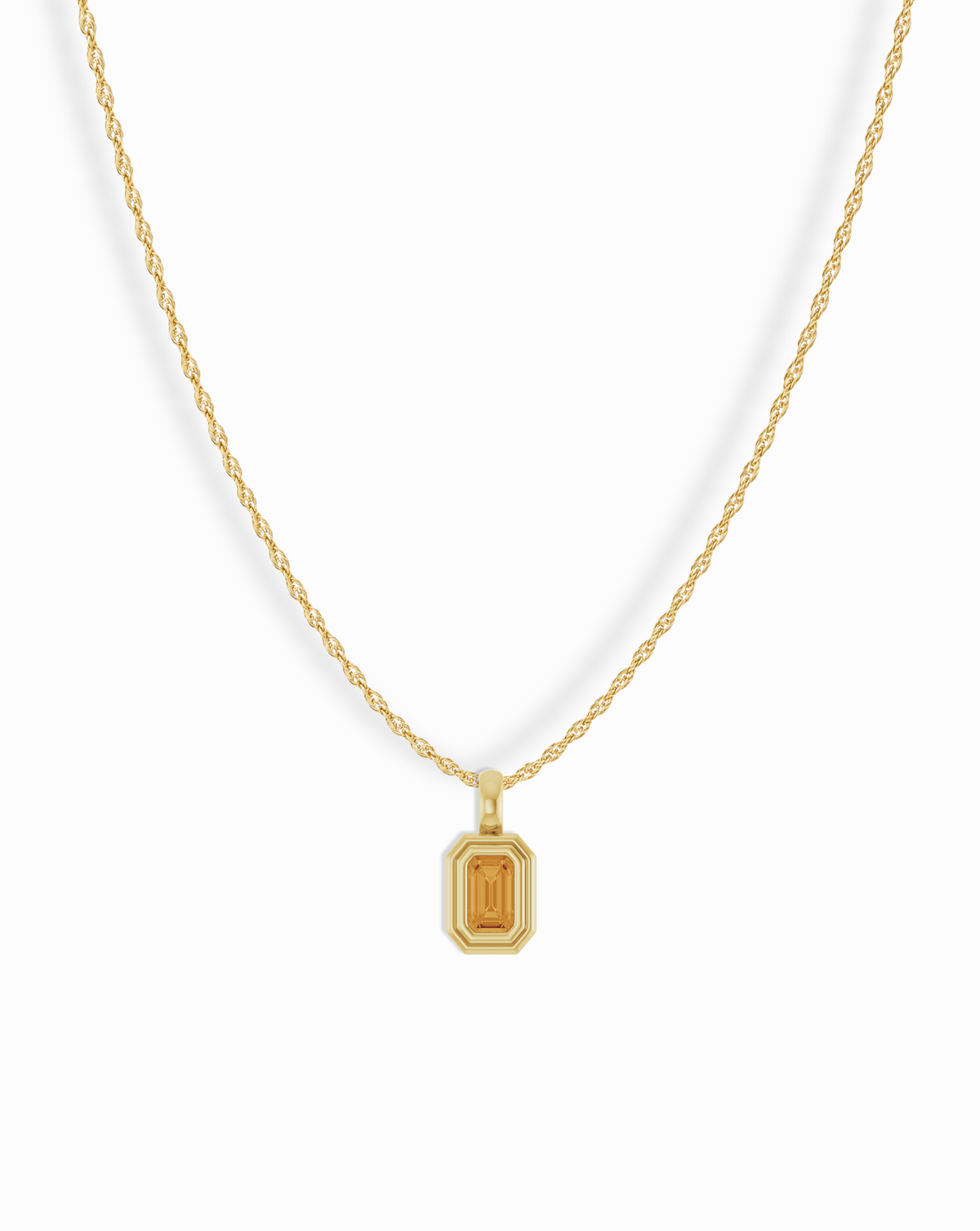 Mod + Jo 14k Birthstone Pendant Necklace featuring a gold rope chain and a rectangular yellow gemstone in a gold setting.