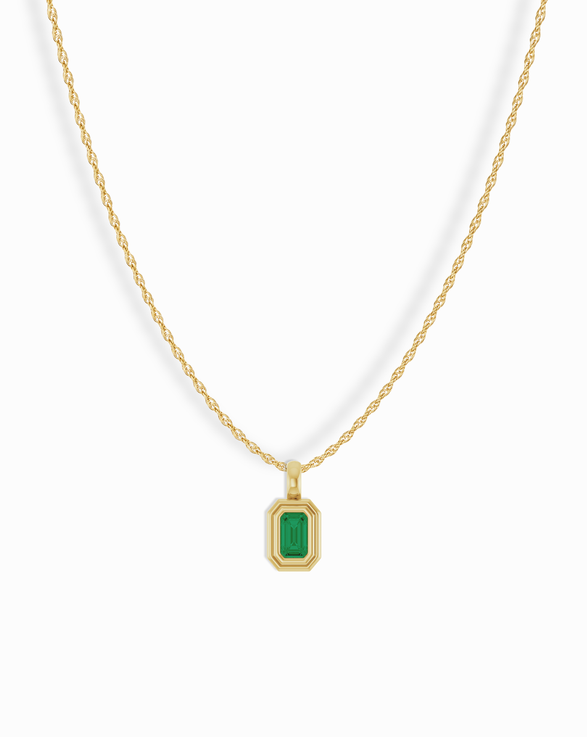 14k Birthstone Pendant Necklace featuring a rectangular emerald in a gold setting on a gold chain.