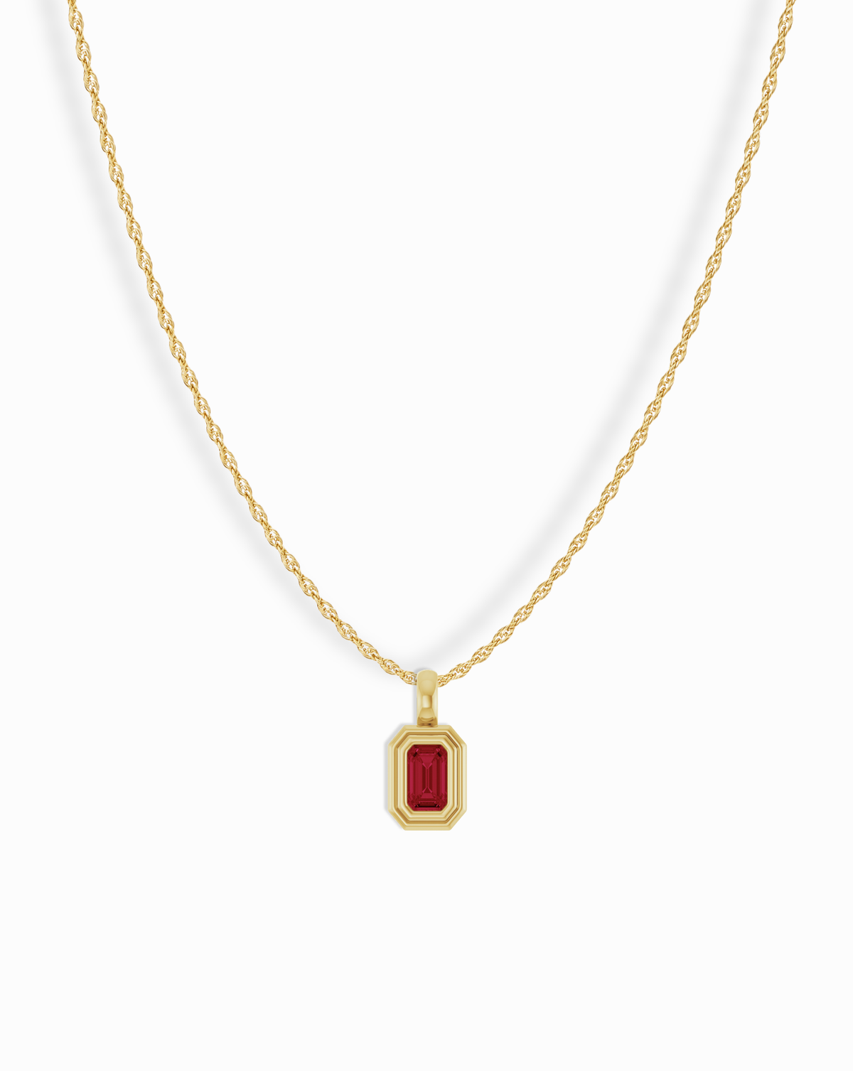 Mod + Jo 14k Birthstone Pendant Necklace featuring a gold chain and a rectangular red gemstone pendant in a stepped frame.