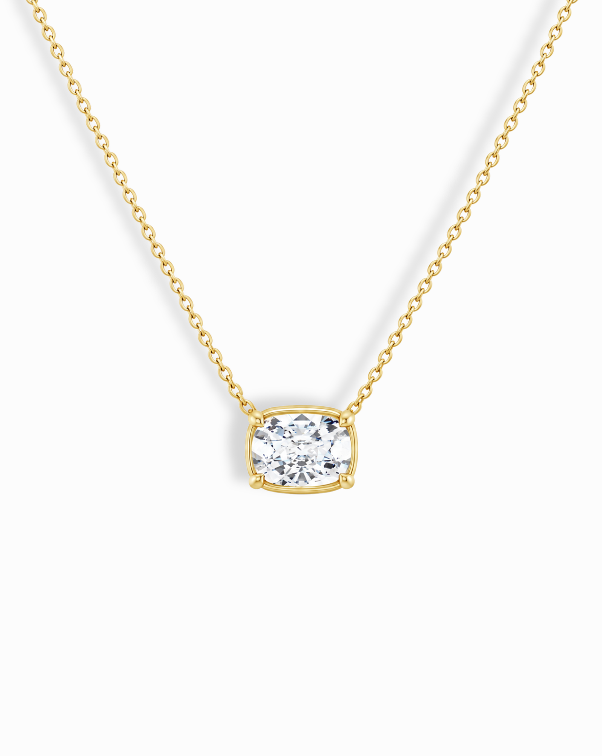 Mod + Jo 14k Cushion Cut Diamond Necklace featuring a cushion-cut lab-grown diamond pendant in a four-prong setting on a 14k yellow gold chain.