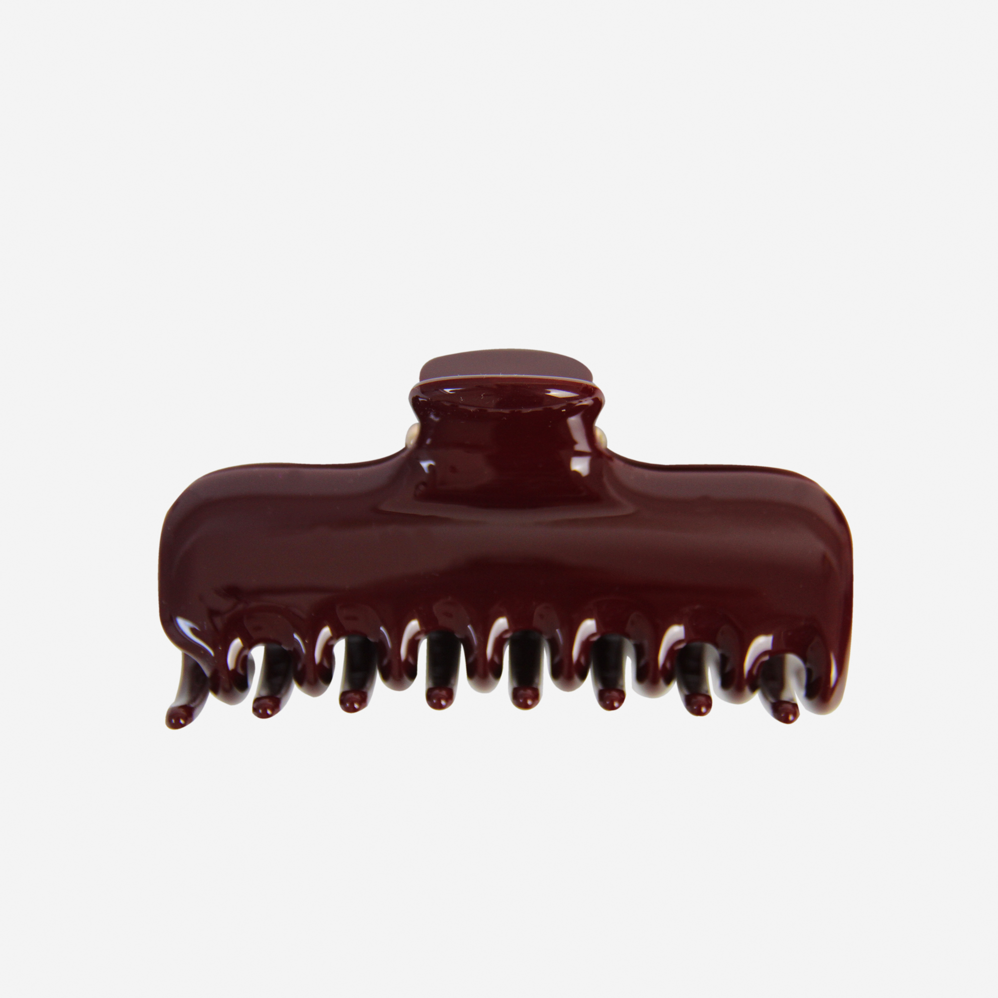The Large Burgundy Hair Claw by BRAID & BOW, featuring interlocking teeth for a secure hold, is displayed against a plain white background. This maroon-colored clip is ideal for mid-length to long hair.
