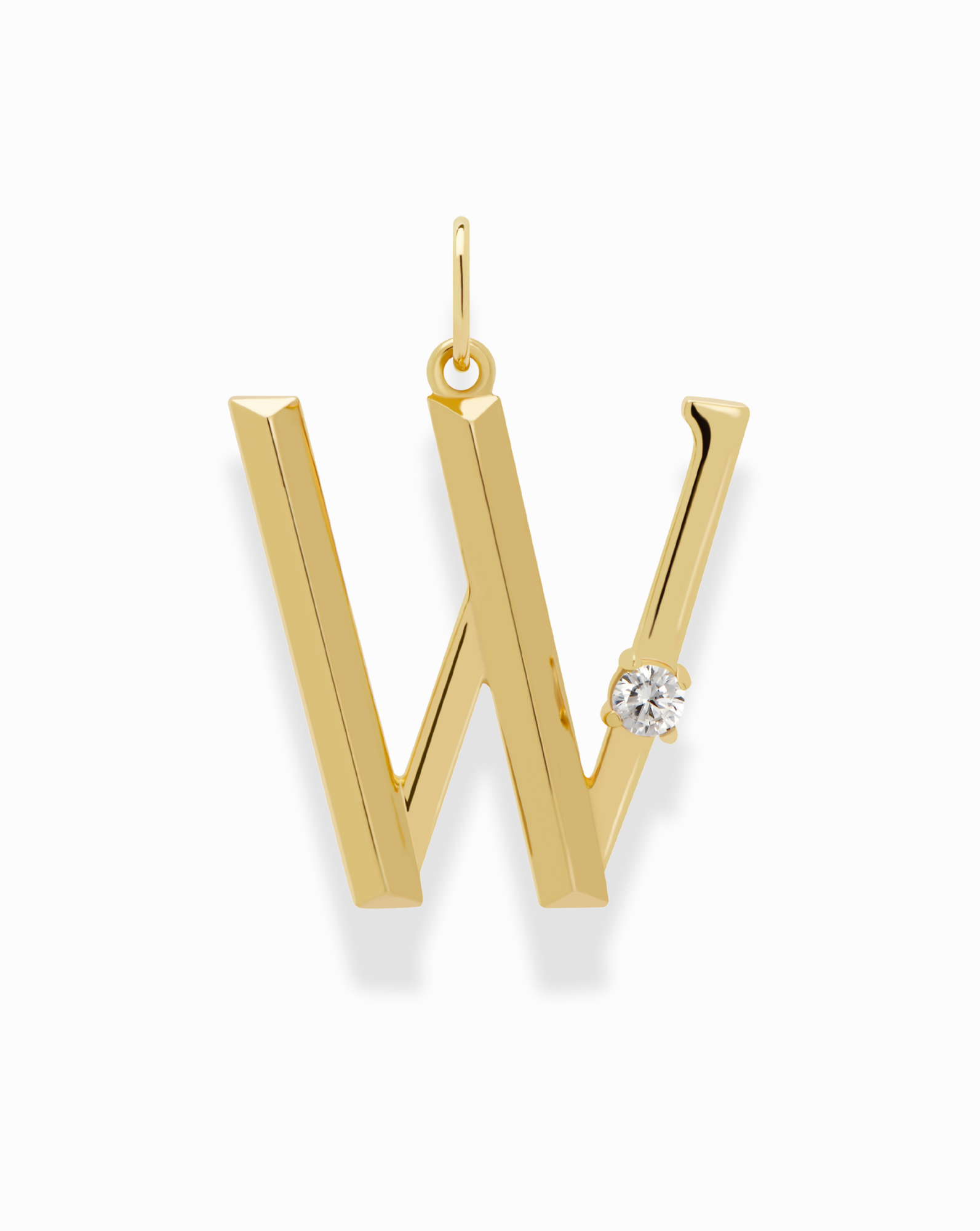 The Eloise Letter Charm by Mod + Jo is a gold "W"-shaped pendant with a diamond accent on the lower right, elegantly hanging from a simple top loop.