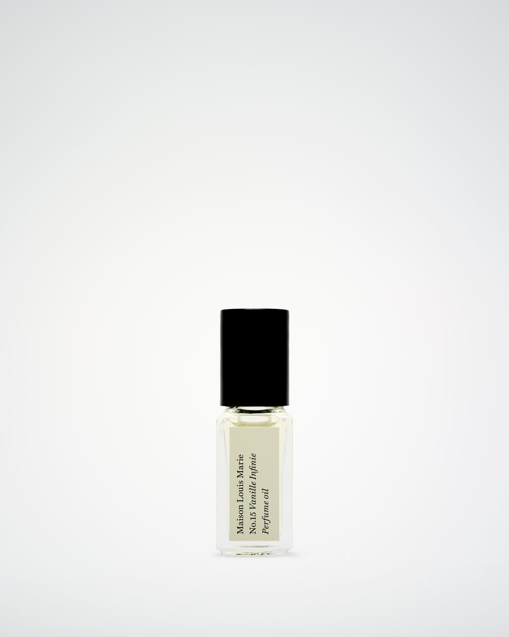 Perfume bottle with black cap on a white background