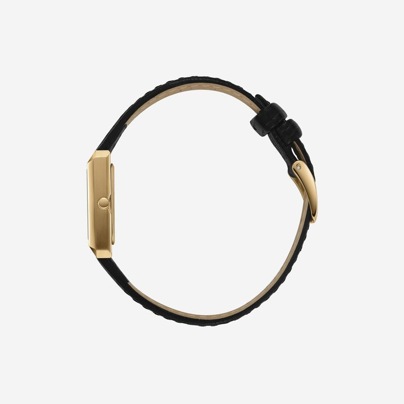 The Virgil Watch Small (Lizard Embossed) by Breda is a gold rectangular wristwatch with a black lizard-embossed band, displayed from the side against a white background.