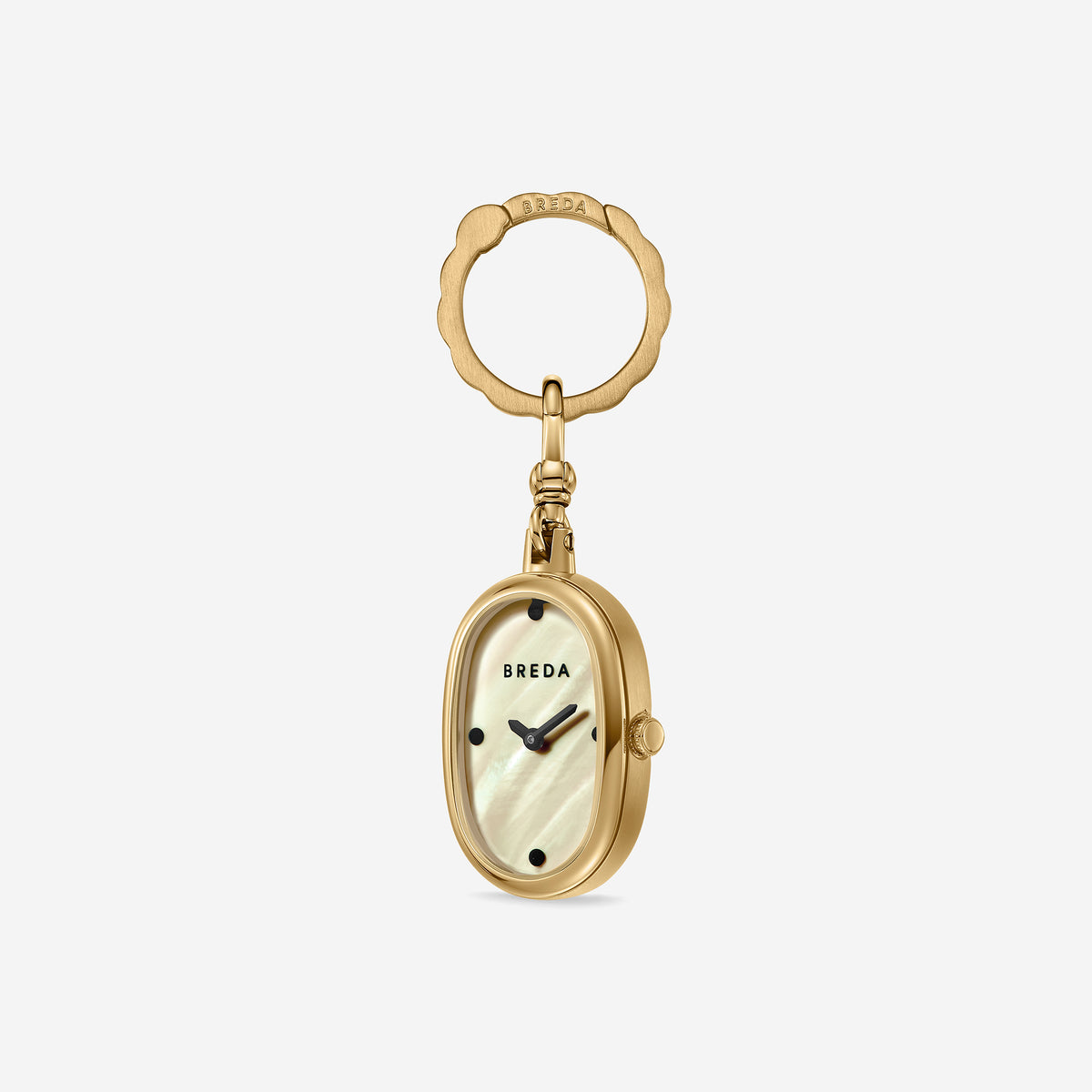Jane Time Charm by BREDA—a gold-plated, oval keychain-style timepiece featuring a mother of pearl dial with black hour markers, BREDA branding at the top, and a decorative gold key ring—elegantly displayed on a plain white background.
