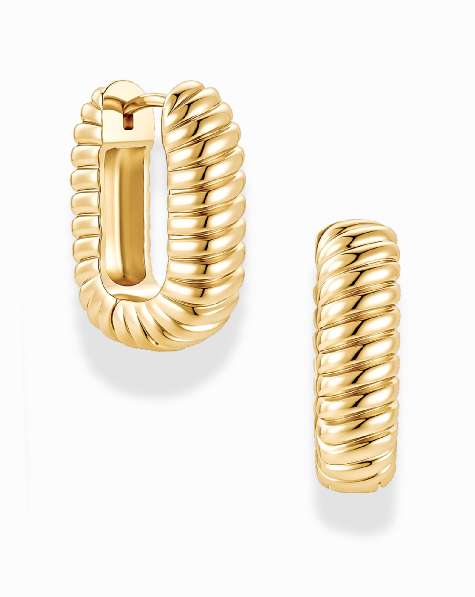 A pair of Elly French Rope Hoops by Mod + Jo, featuring a ribbed, twisted texture inspired by classic French designs. One hoop is shown facing forward and the other from the side to showcase their rounded, bold silhouette and lightweight construction.