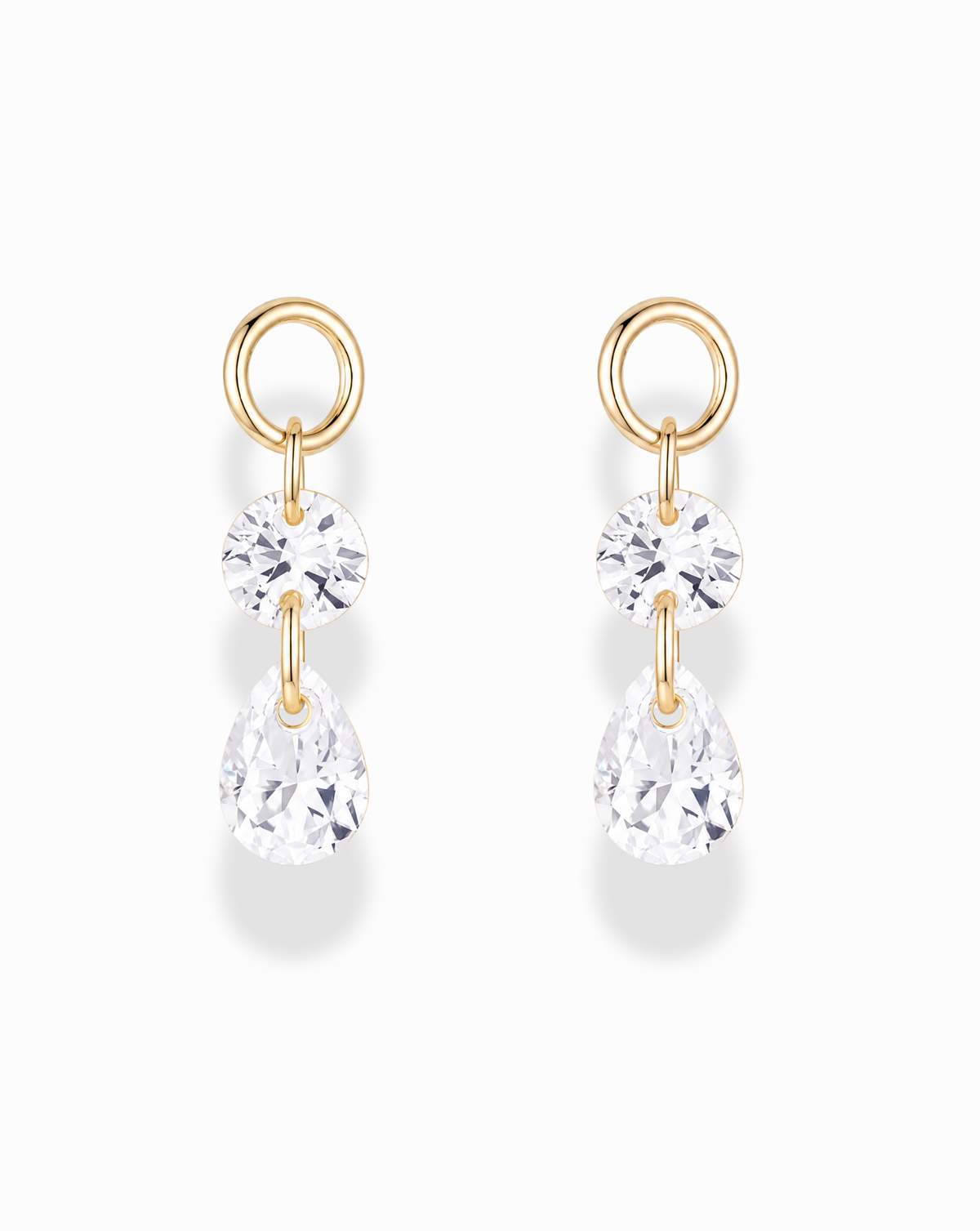 Emory Sapphire Earring Charms featuring a round lab-grown white sapphire drop suspended below a pear-shaped crystal on a gold-plated hoop.