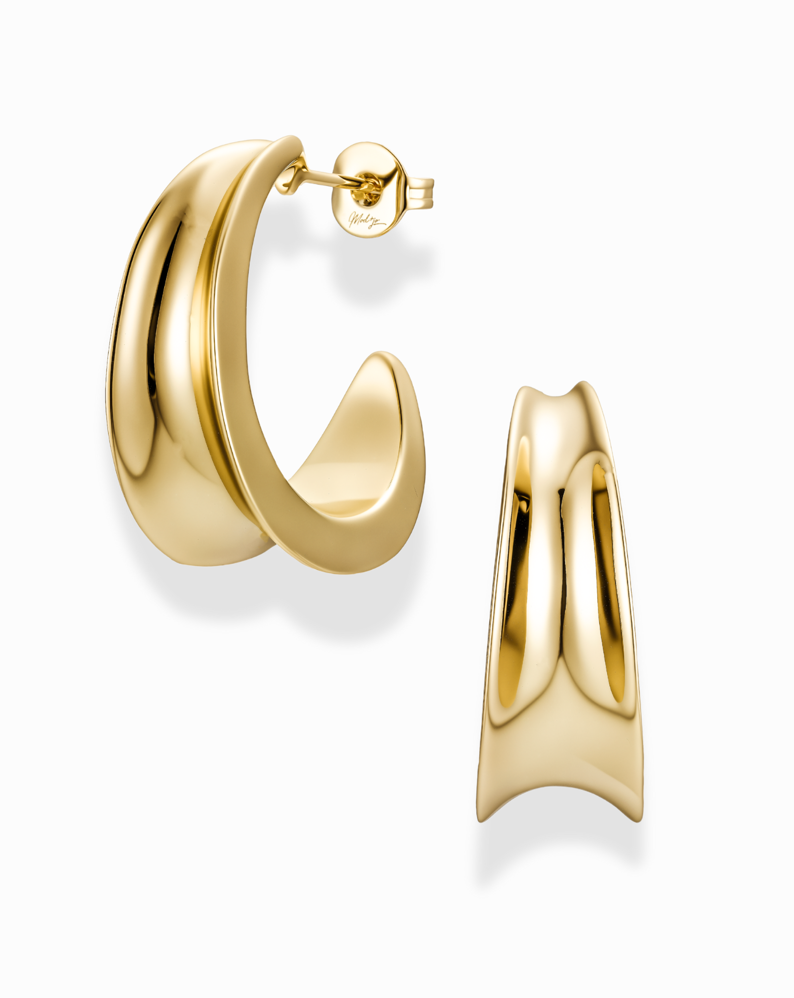 Gold inverted knife edge hoop earrings on a white background