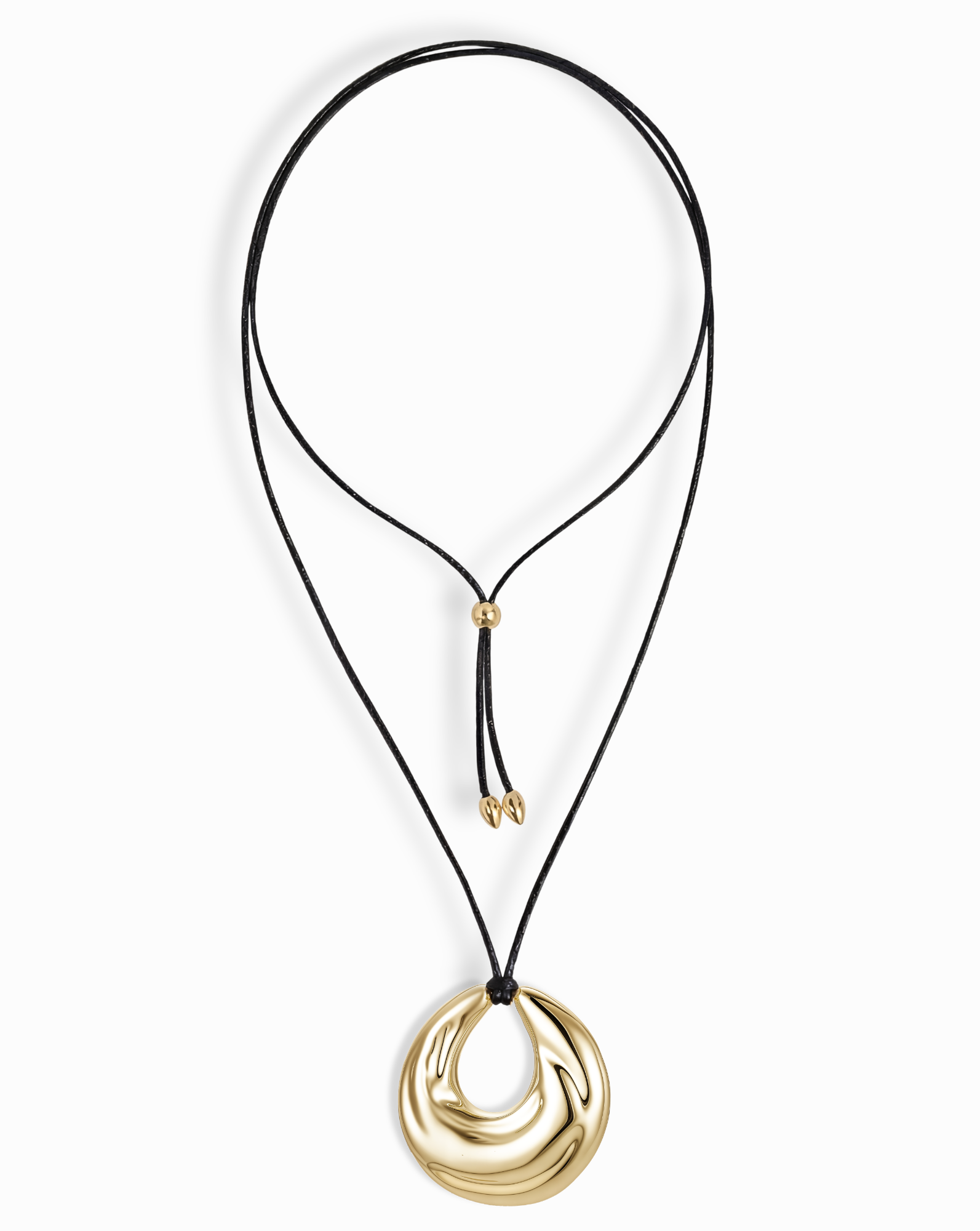 The Mod + Jo Kira Cord Necklace features a black cord with adjustable gold bead fasteners and a bold, shiny abstract gold pendant in an eye-catching circular design.