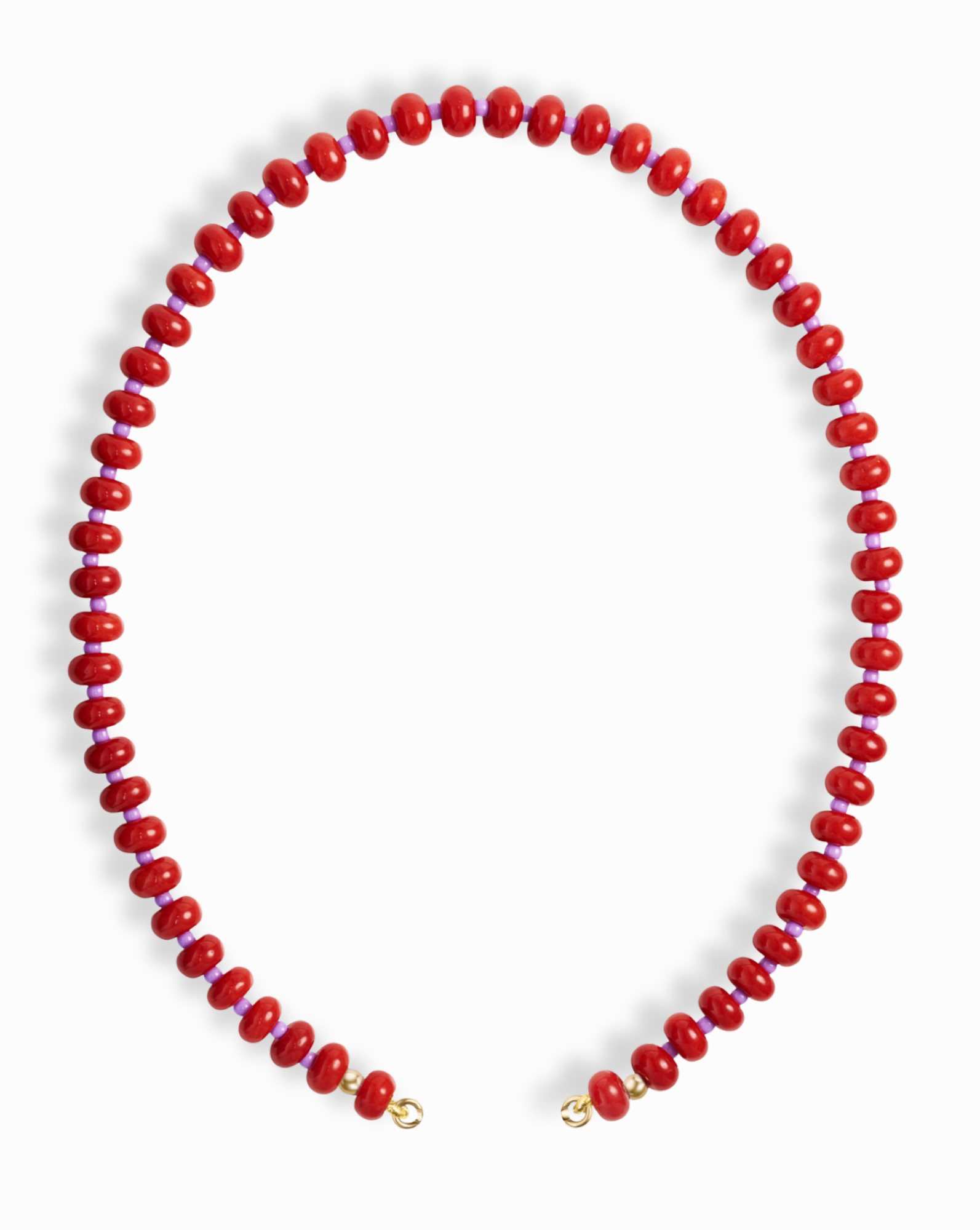 The Mod + Jo Macey Gemstone Necklace features evenly spaced round red natural semi-precious stones with small gold clasps at each end, arranged in an open circle on a white background.