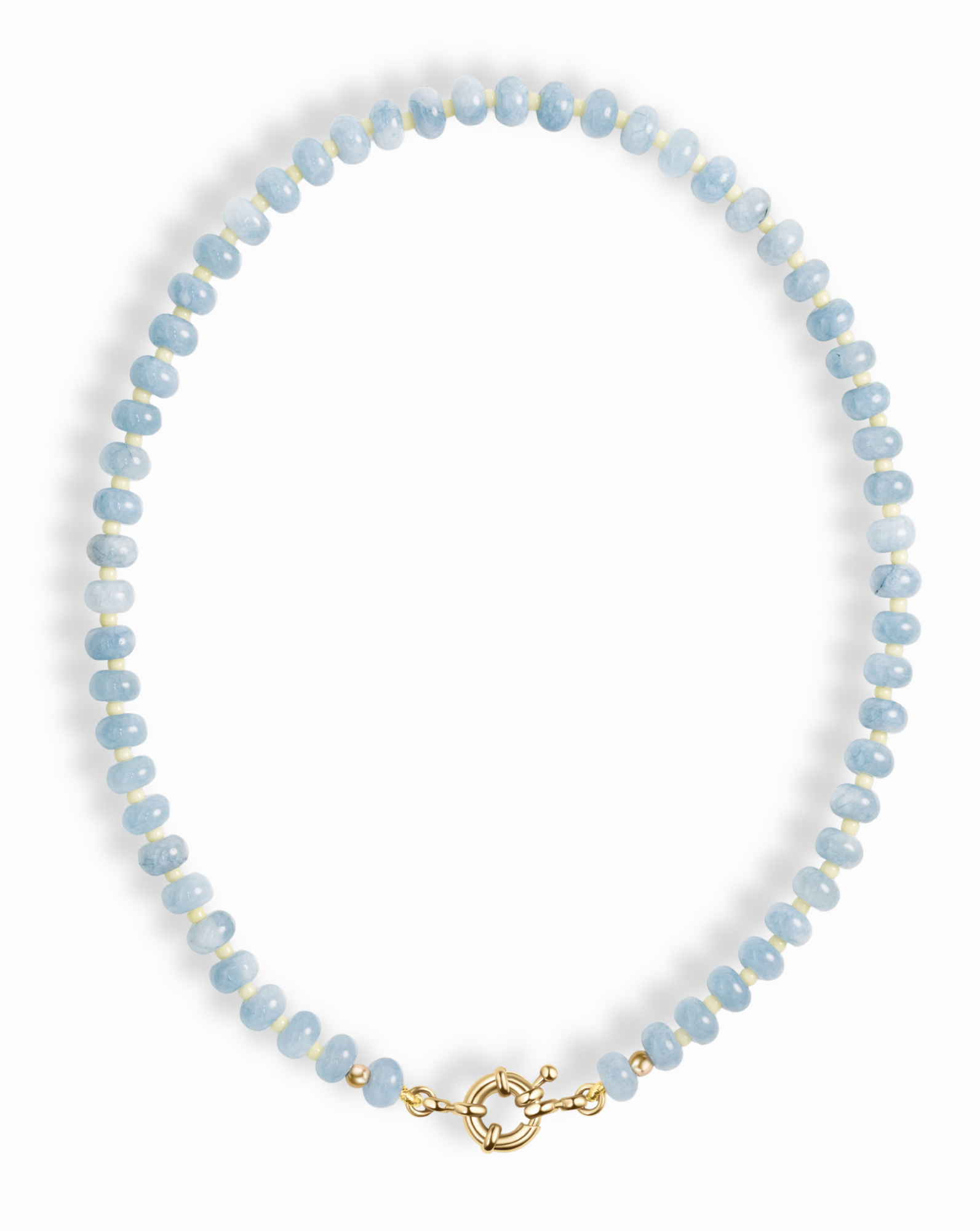 The Macey Gemstone Necklace by Mod + Jo features round light blue and white beads with a gold toggle clasp, displayed in a circle on a white background.