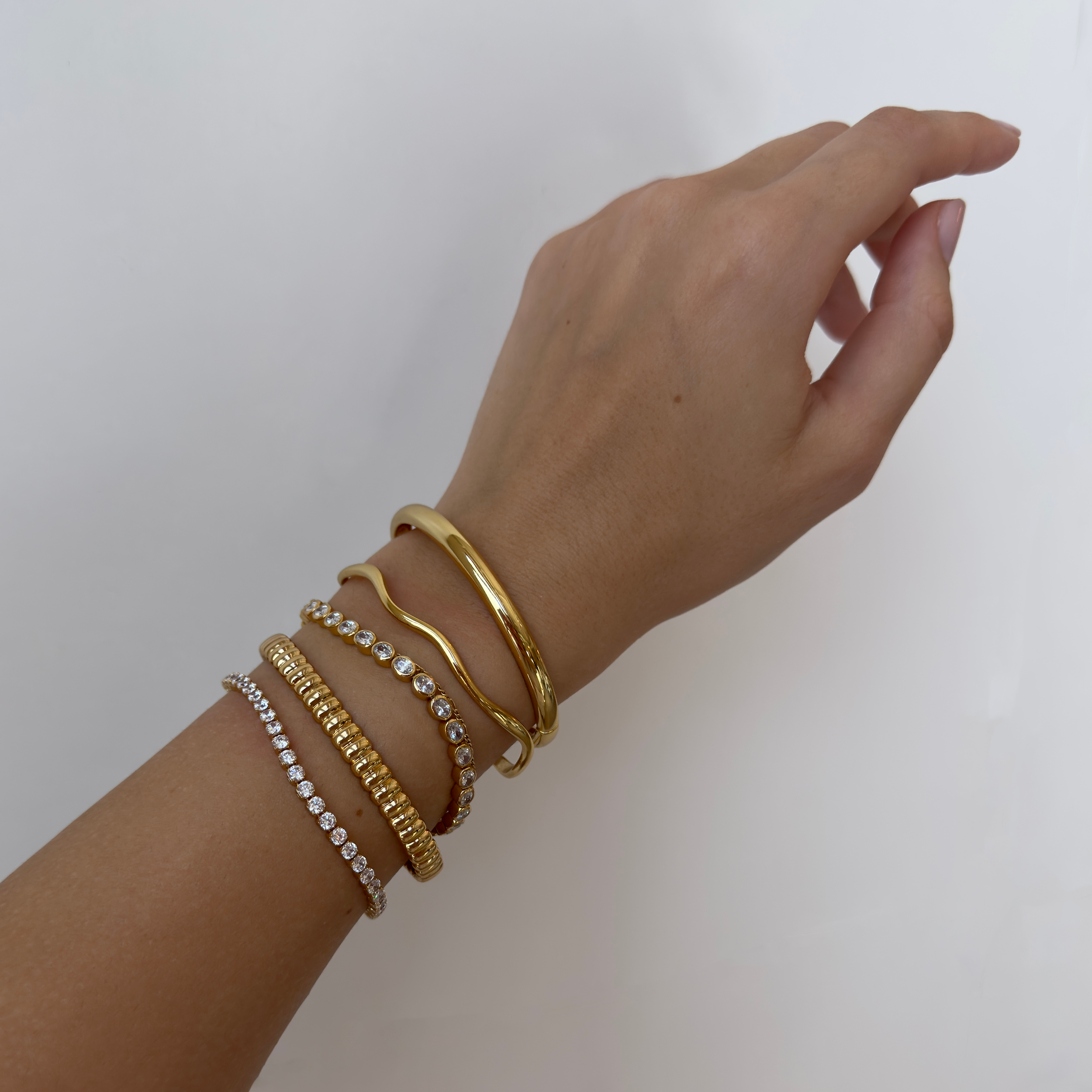 gold bangle and cuff bracelets | Mod + Jo