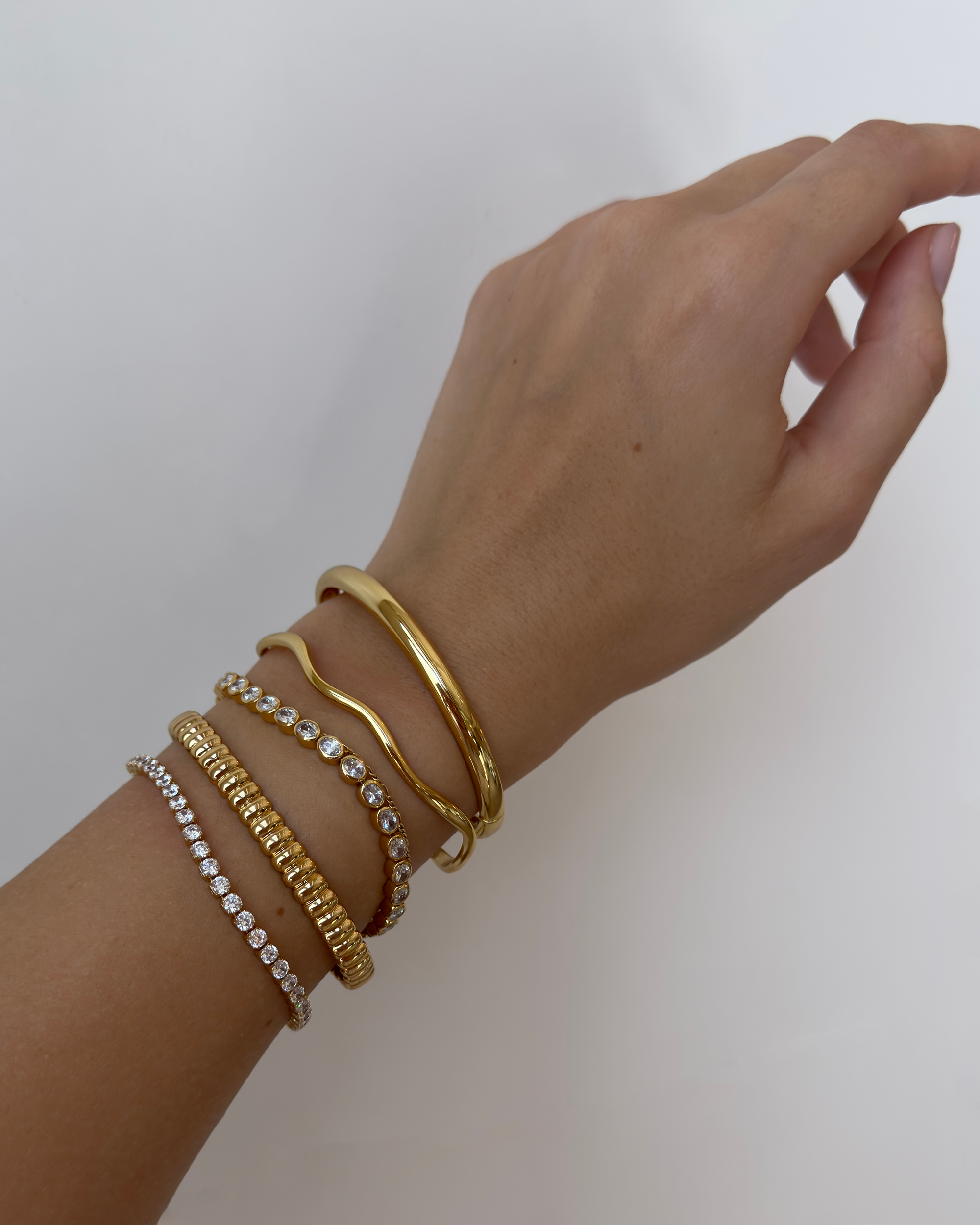 gold bangle and cuff bracelets | Mod + Jo