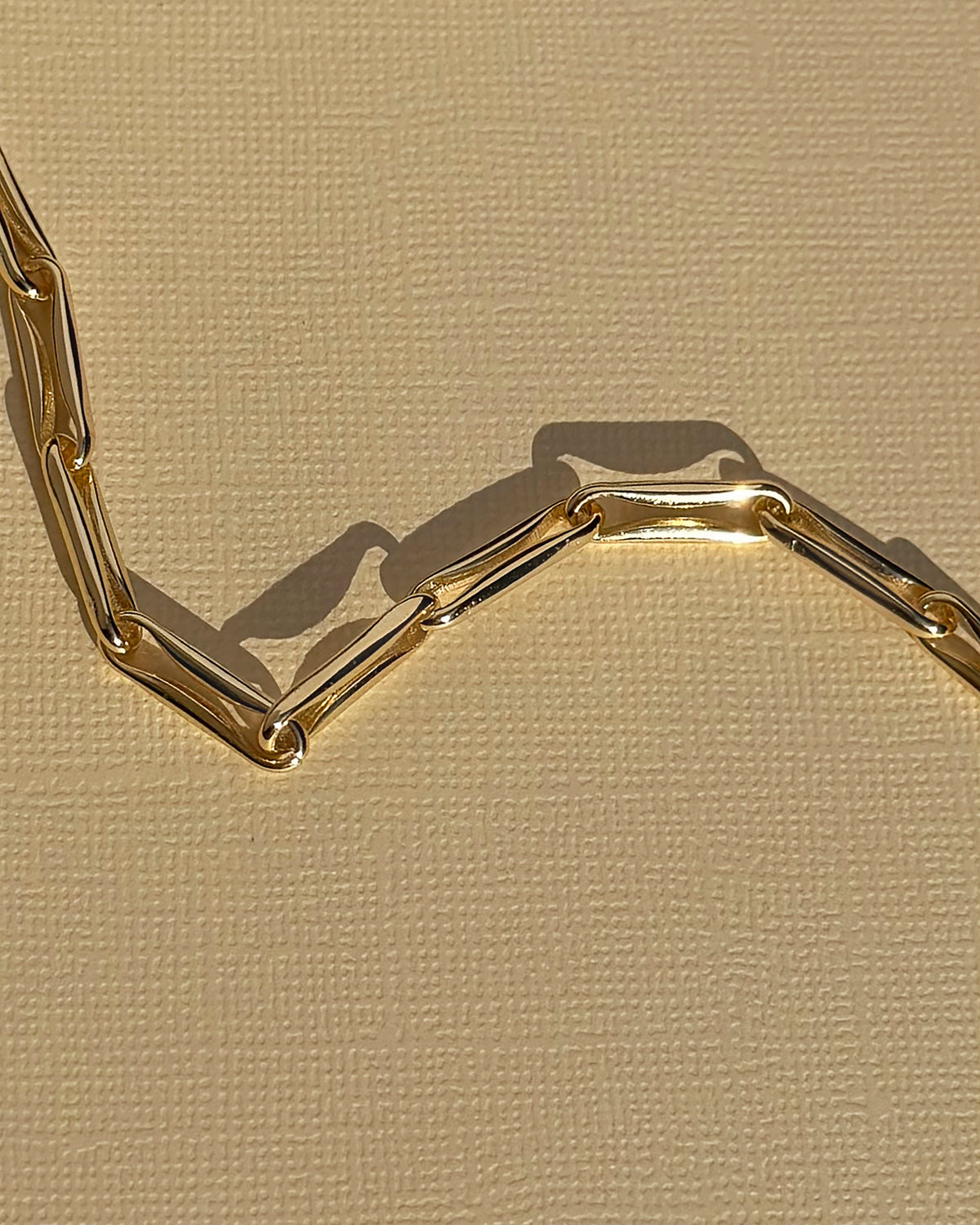 Molly Elongated Link Chain Bracelet in gold with a nickel-free finish.