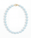 The Portia Gemstone Necklace by Mod + Jo features a single strand of round, light blue natural aquamarine beads with a gold clasp, displayed on a white background.