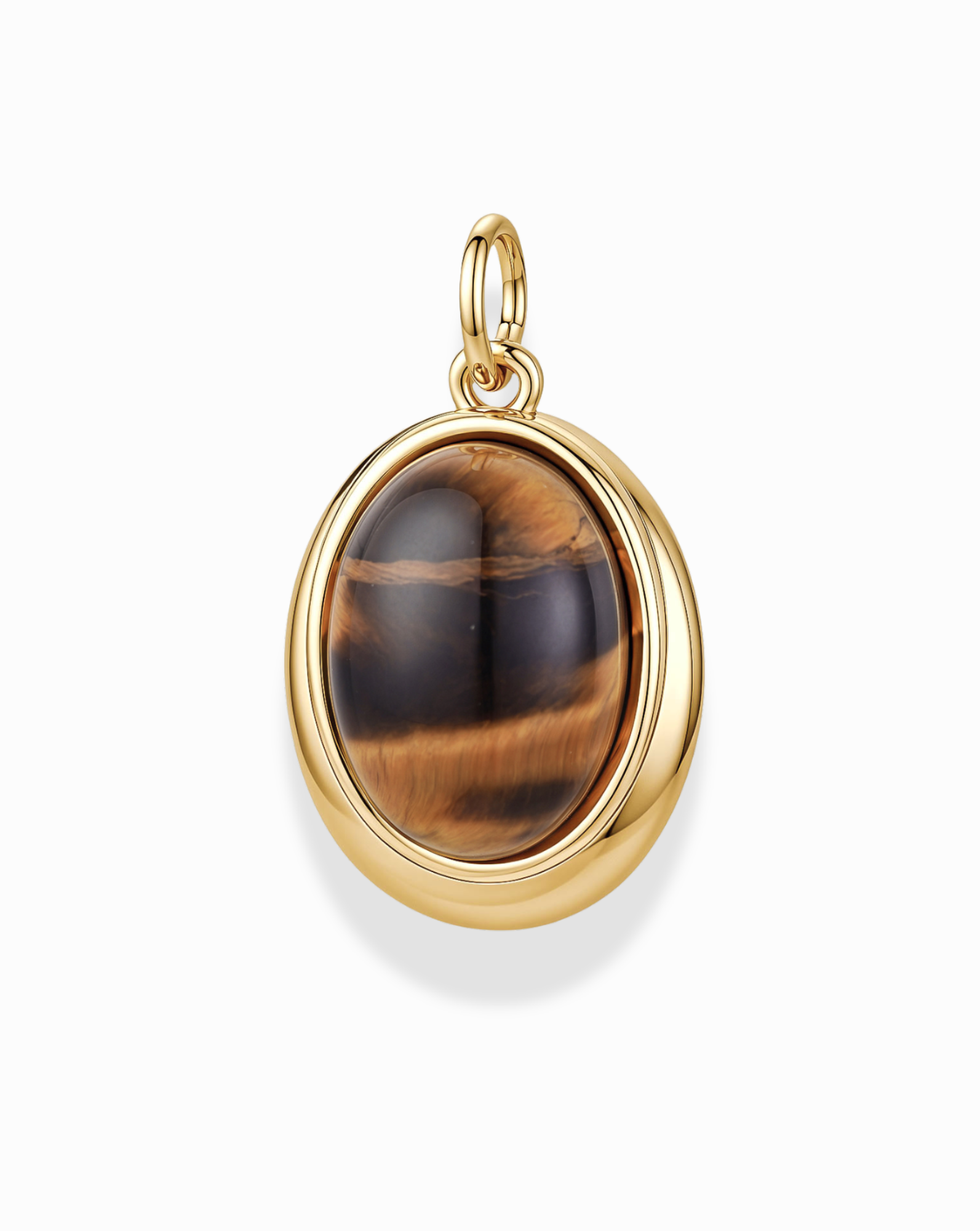 Introducing the Rory Gemstone Charm by Mod + Jo—a stunning gold-plated pendant showcasing an oval Tiger’s Eye gemstone with mesmerizing brown and golden bands. This exquisite piece is set in a polished 14k gold bezel with a convenient loop for your favorite chain, elegantly displayed against a white background. The Rory Gemstone Charm beautifully captures the natural allure of Tiger’s Eye, making it a standout addition to any jewelry collection.