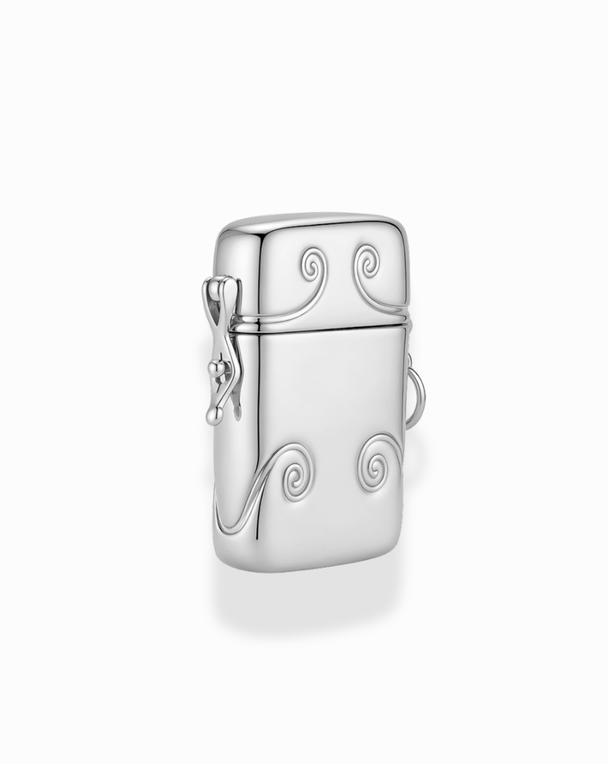Sybil Vesta Case Charm featuring Victorian-style silver plate with embossed swirl patterns and a small side clasp.