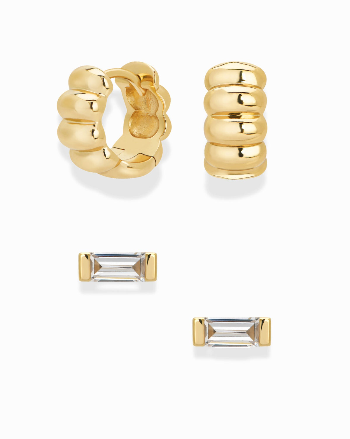 Mod + Jo Sylvie + Jadey Set featuring a pair of gold ribbed Sylvie Huggies and a pair of gold baguette-cut crystal stud earrings.